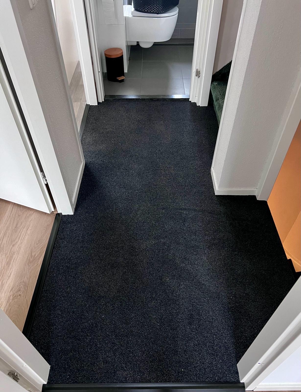 Trap met tapijt in Garderen