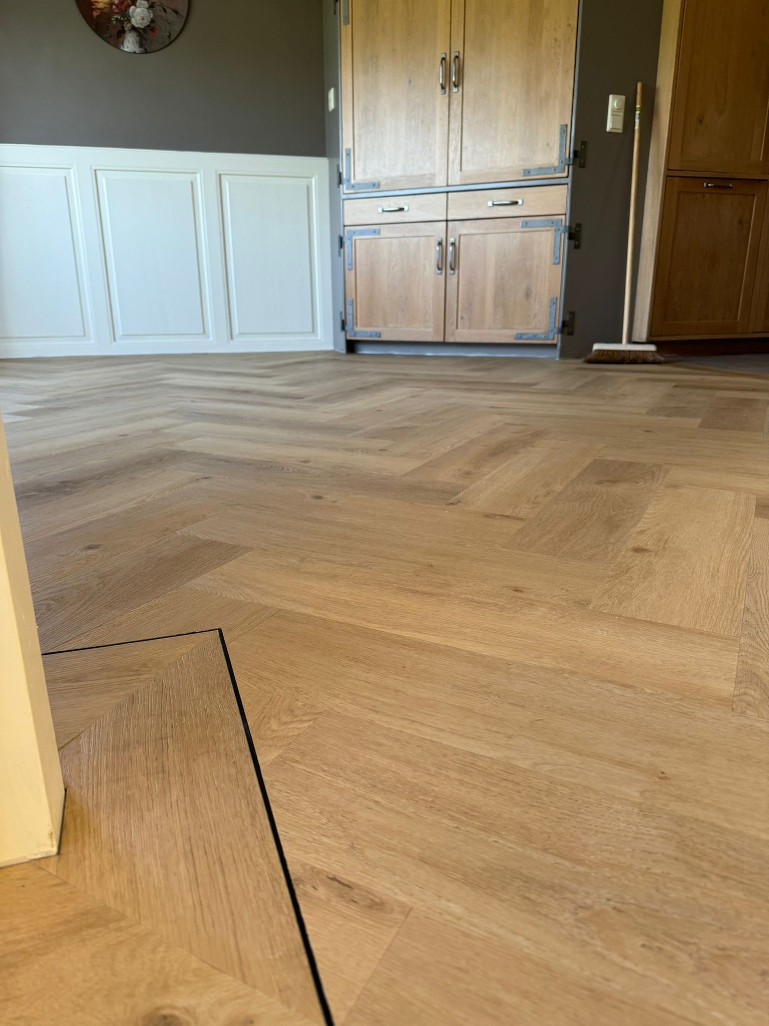 Pvc visgraat vloer met band en bies